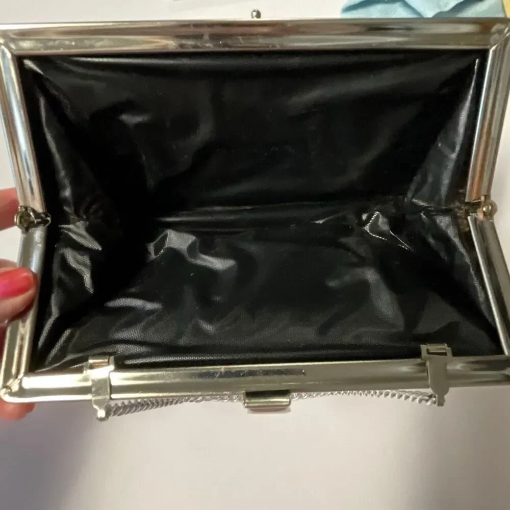 Vintage silver clutch with chain handle. Silver metallic